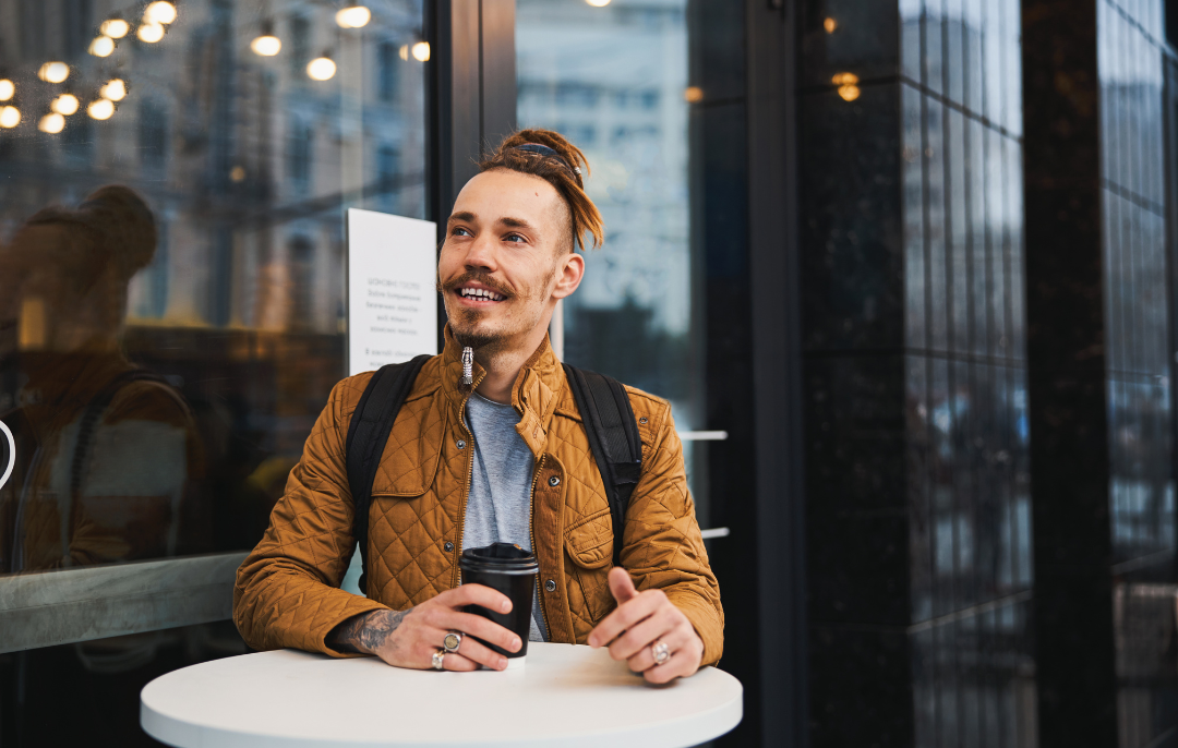 Someone is enjoying a cup of coffee at a café.